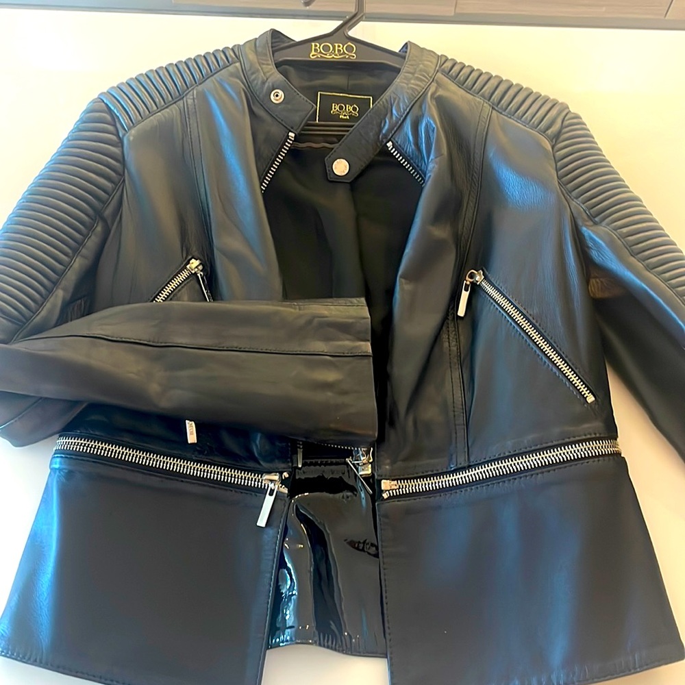 Black leather jacket from the luxury Brazilian brand called Bo.Bo, size small.